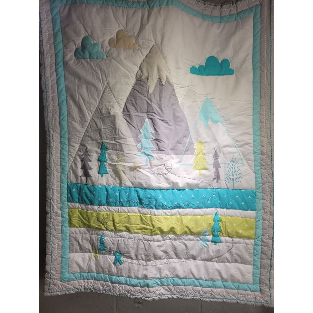 Cloud Island Quilted Blanket Mountains Trees Clouds Blue White Gray Wall Crib